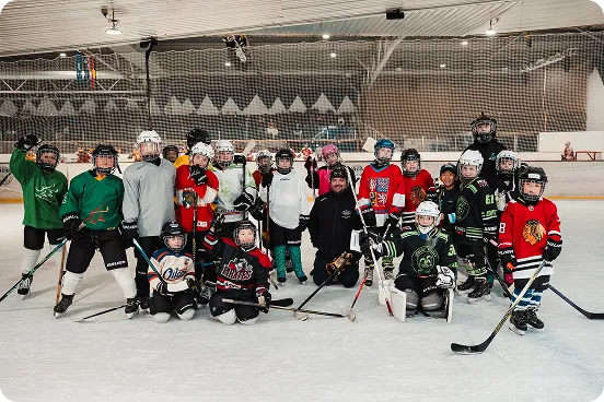 Students participating in an ice arena school sport program